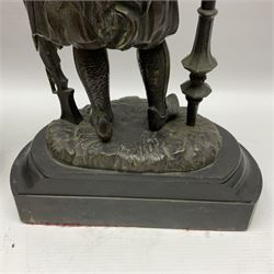 Pair of bronzed figure modelled as a hunter in traditional dress, each holding a pike, H48cm