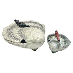 Two Majolica Bordallo Pinheiro style oyster tureens, modelled as oyster shells, each with coral finials to covers, largest H18cm, D22cm