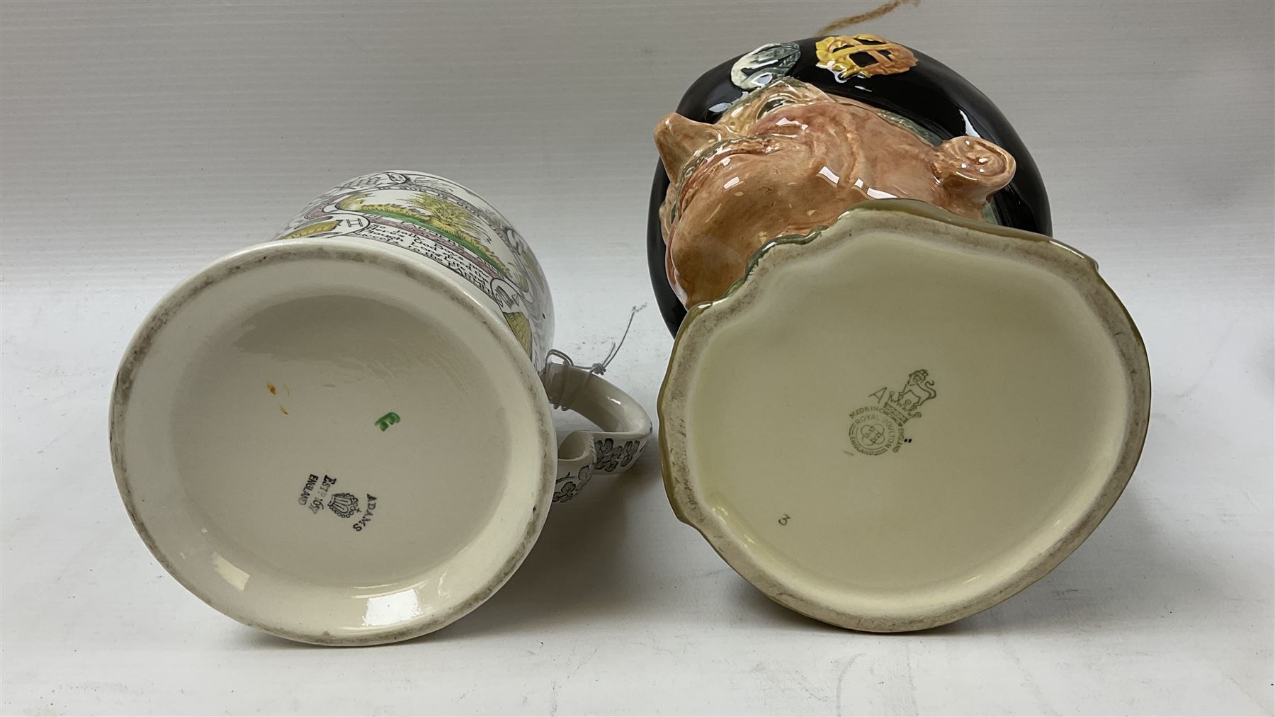 Adams 'The Farmers Arms' mug, transfer printed, H12.5cm, together with a Royal Doulton character jug 'Monty', H15.5cm