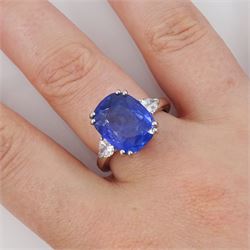 French 18ct white gold and platinum three stone unheated Ceylon sapphire and diamond ring, the single mixed cushion cut sapphire of 8.49 carat, with Gem Paris report, flanked by pear cut diamonds, hallmarked, total diamond weight approx 0.60 carat