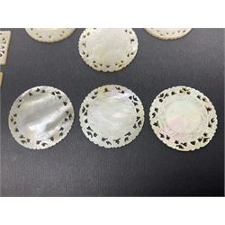 Collection of twenty Chinese mother of pearl gaming counters or tokens, of rectangular and circular form, various decoration, largest rectangular examples L6cm