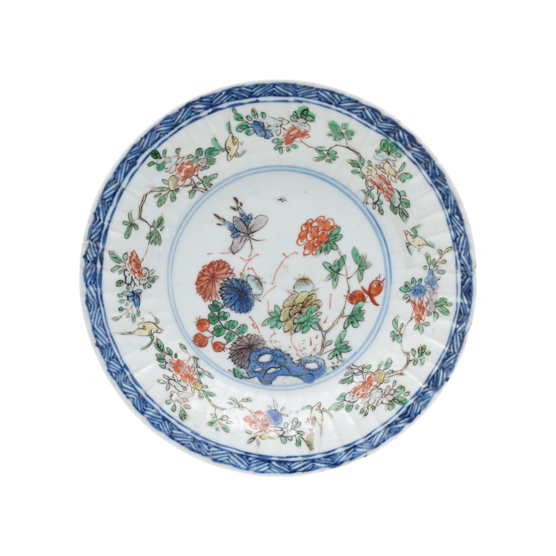 Two Chinese Kangxi period famille verte cafe au lait saucers, decorated with native animals among foliage, with indistinct mark within double rings beneath, D14cm 