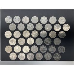Forty Queen Elizabeth II commemorative fifty pence coins from circulation
