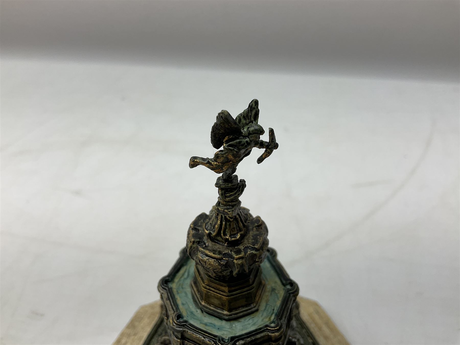 Five Lilliput Lane models from the 'Britain's Heritage' collection, comprising The Royal Albert Hall, Windsor Castle Round Tower, Eros and Nelson's Column and another snowed, all boxed