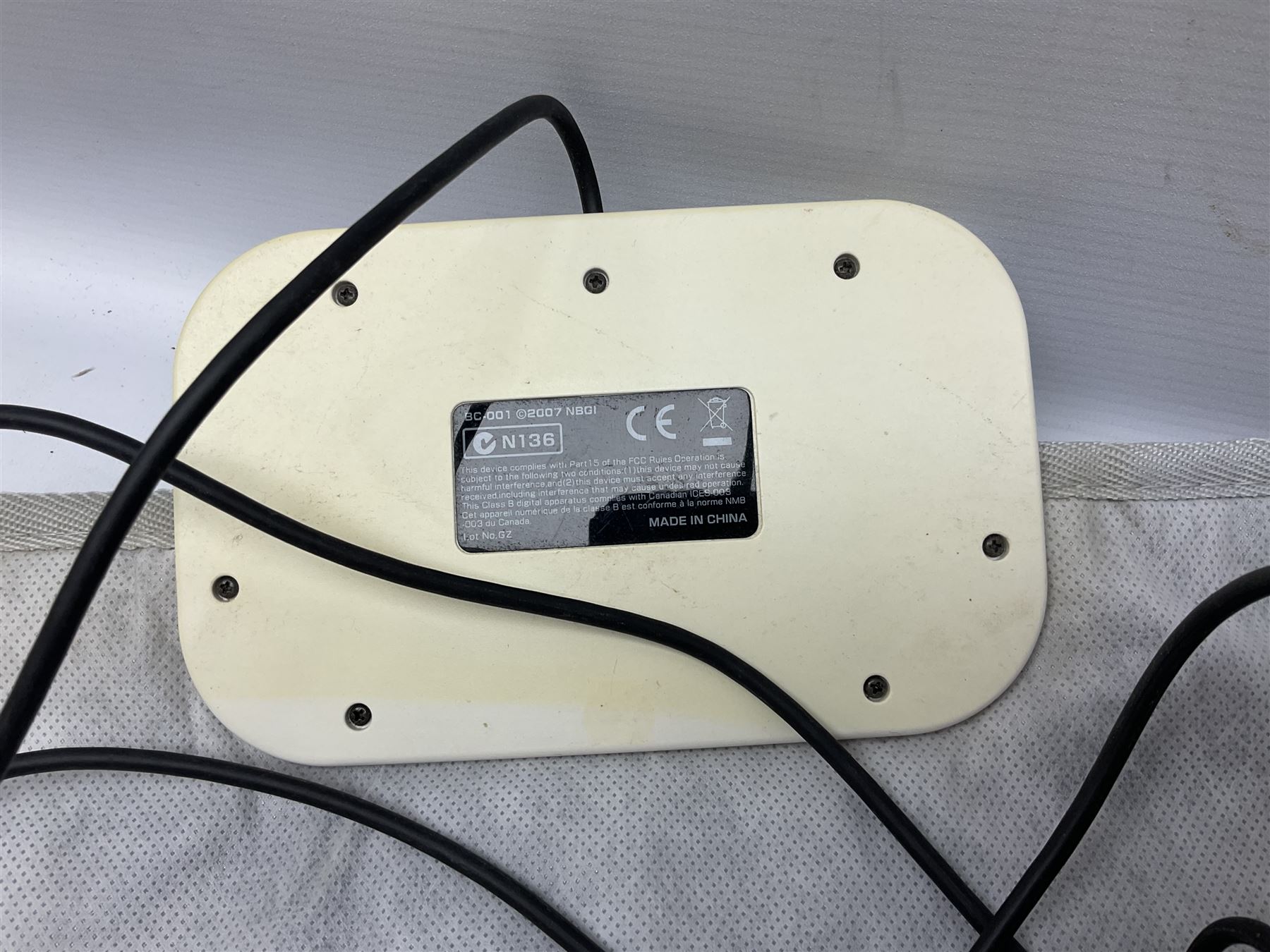 Nintendo Wii console, four controllers with cases and four nunchucks, Wii sensor bar, balance board and dance mat. Guitar hero wireless guitar for Wii and Redoctane wired guitar. Nintendo DS lite handheld gaming console, console and game cases and Guitar Hero Redoctane Guitar Grip. Selection of Nintendo Wii and Nintendo DS lite games to include Super Mario Galaxy, Guitar Hero, Wii Fit, Legend of Zelda games etc. Archos AV400 Series pocket video recorder with accessories, cradle and remote, in three boxes