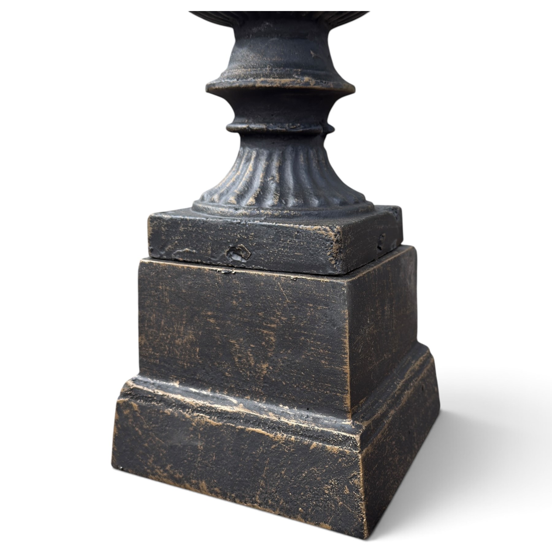 Pair of Neoclassical design black and gilt painted cast iron garden urns of campana form, with egg-and-dart rims and fluted bodies, on knopped stems, fluted socles and stepped square plinth bases