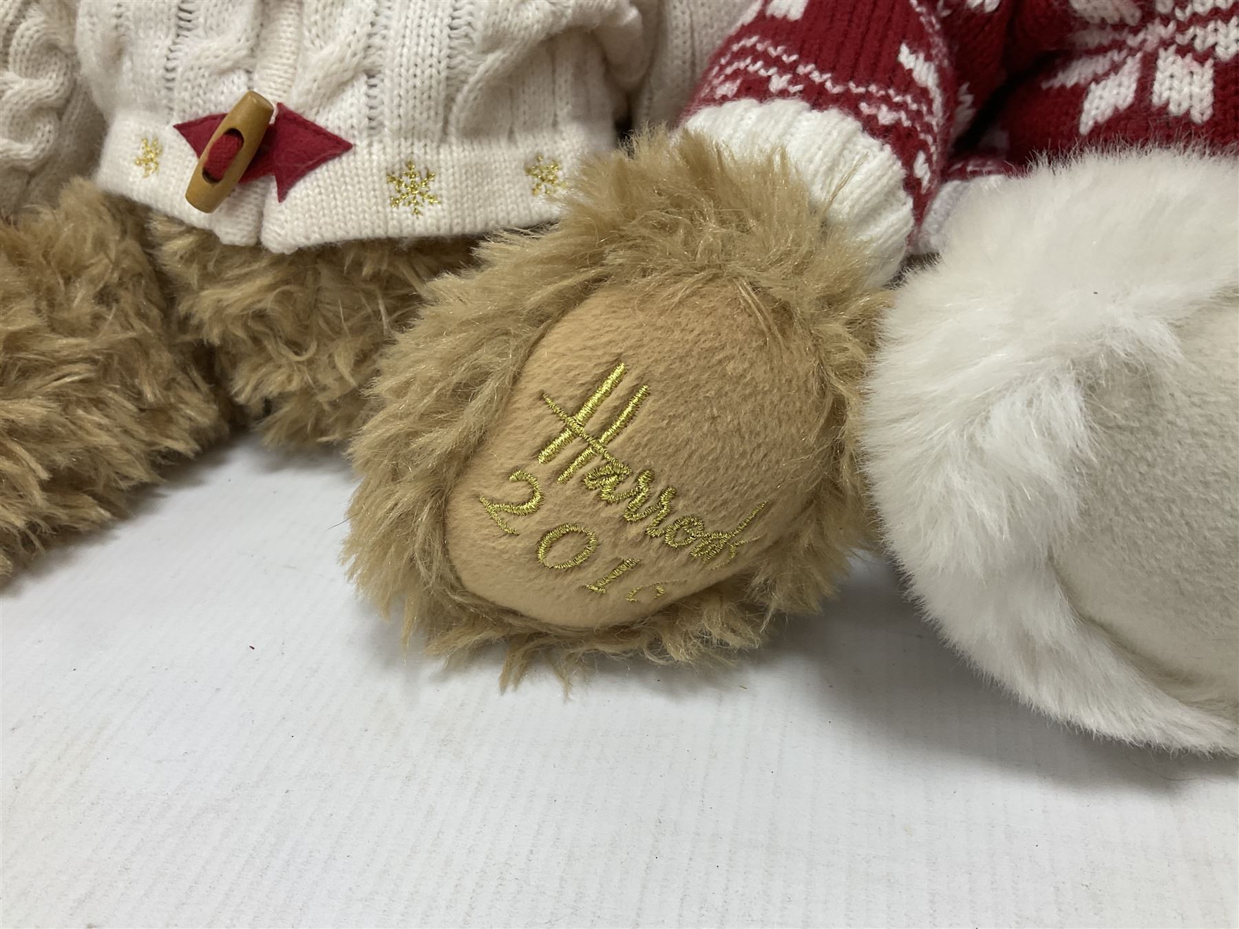 Six Harrods annual teddy bears, dating between 2011 and 2016, tallest H38cm