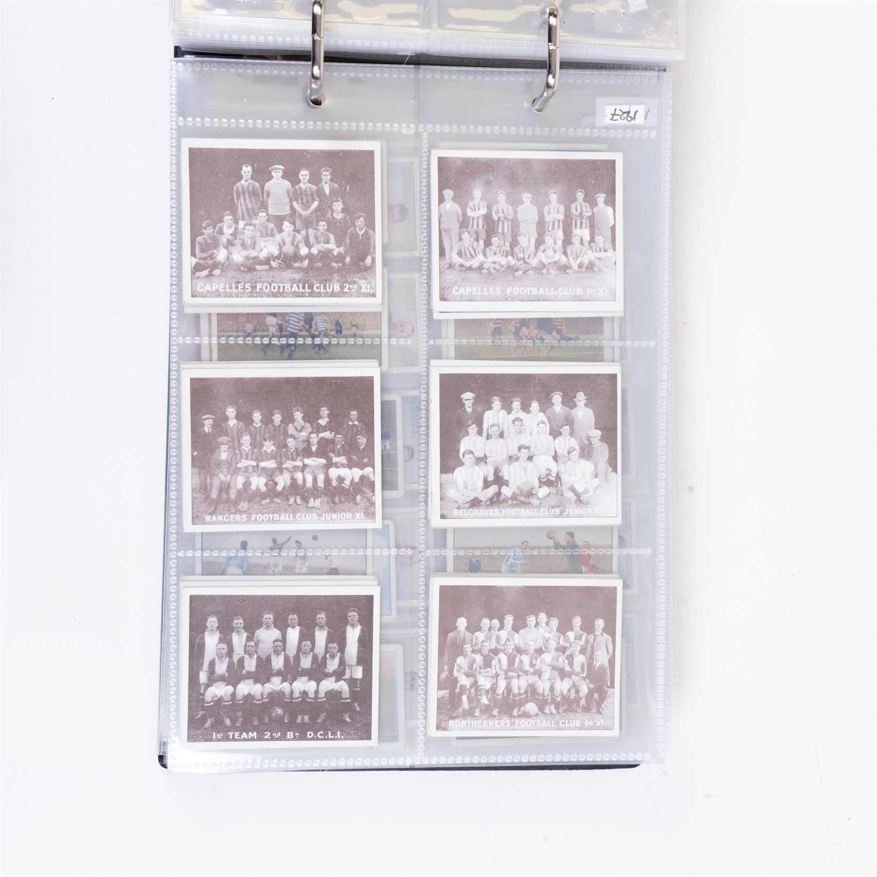 Collection of Edwardian and later Football related trading and cigarette cards, including forty-nine of fifty 1906 Ogden's Football Club Colours, 1922 PALS Footall series, ninety of one hundred 1925 Gallaher Famous Footballers, complete set of forty-four 1926 Ogden's Captains of Association Football Clubs and Colours, complete set of fifty 1927 Players Football Caricatures by MAC,  complete set of fifty 1927 Players Football Caricatures by RIP,  complete set of fifty 1930 Players Association Cup Winners, complete set of 50 1933 Ogdens AFC Nicknames etc, housed in brown cigarette card album