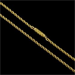 Early 20th century gold rope twist chain necklace, the barrel clasp with engraved decoration, stamped 15