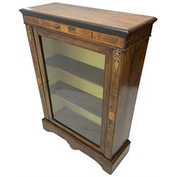 Victorian walnut pier cabinet, moulded rectangular top over inlaid frieze and uprights, enclosing by single glazed door, the interior fitted with two shelves, on shaped bracketed plinth base