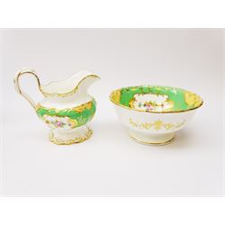 19th century Minton tea set, comprising twelve teacups, eleven saucers, fifteen side plates, cream jug, slop bowl, and two cake plates, decorated with panels of floral sprays, upon a green ground, heightened with gilt throughout, with printed puce mark beneath, and pattern number 5329

