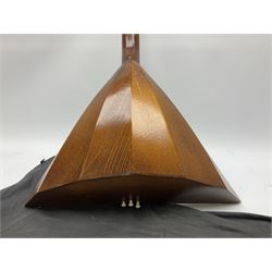 Russian balalaika with six-piece segmented back, the top painted with a scene of Russian onion capped buildings monogrammed K.B.H.1993; bears cyrillic label; L67.5cm; in carrying bag