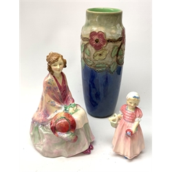 An early Royal Doulton figurine, Rosabelle HN1620, with marks to base, together with another smaller example, Tinkle Bell HN1677, a Doulton Lambeth vase with tube lined floral decoration to the green and blue ground, 