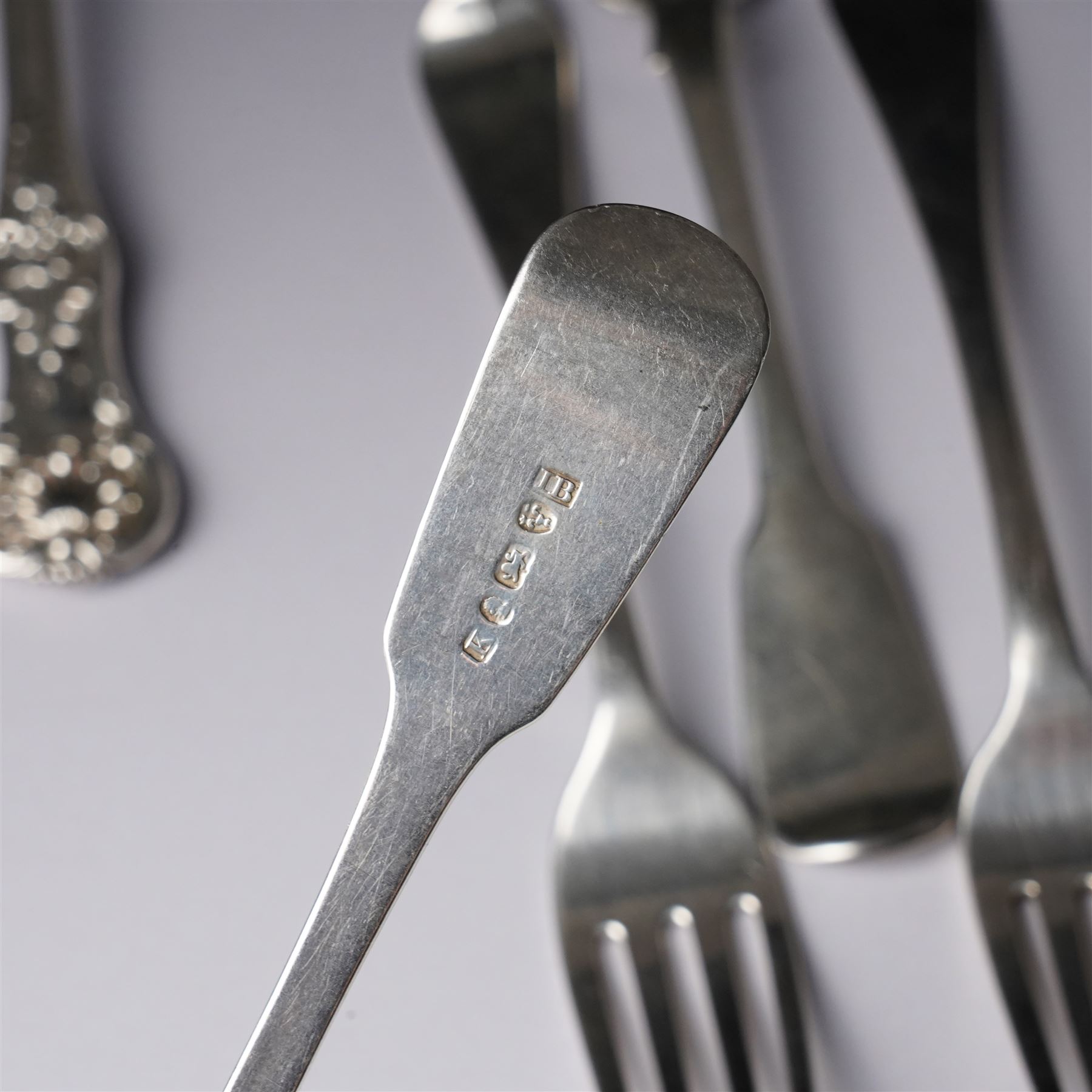 Pair of George IV silver fiddle pattern dessert forks, London 1824, another pair London 1828 and seven other 19th century silver dessert forks various dates and makers (11)