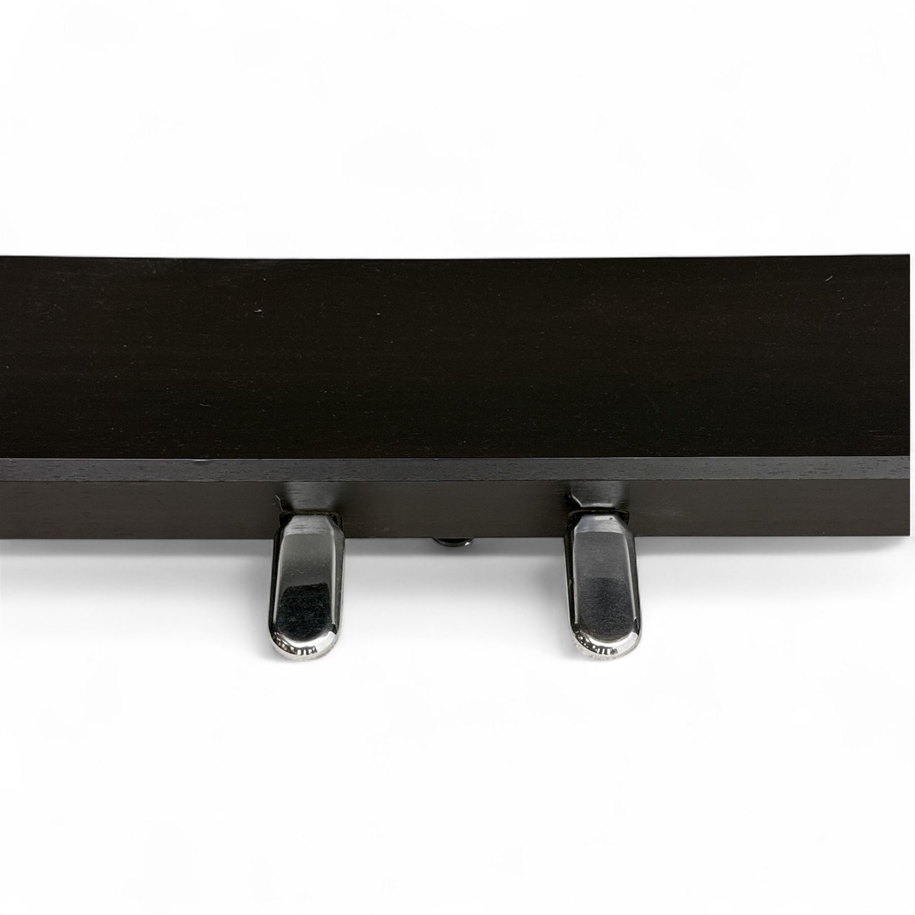 Yamaha Clavinova CLP-550 digital piano, full-size weighted keyboard with integrated pedals and speakers, in dark wood effect casing, accompanied by matching padded bench, Sennheiser headphones, original manuals, and factory-issued cassette tape titled 'Pure & Simple – CLP Digital Pianos'