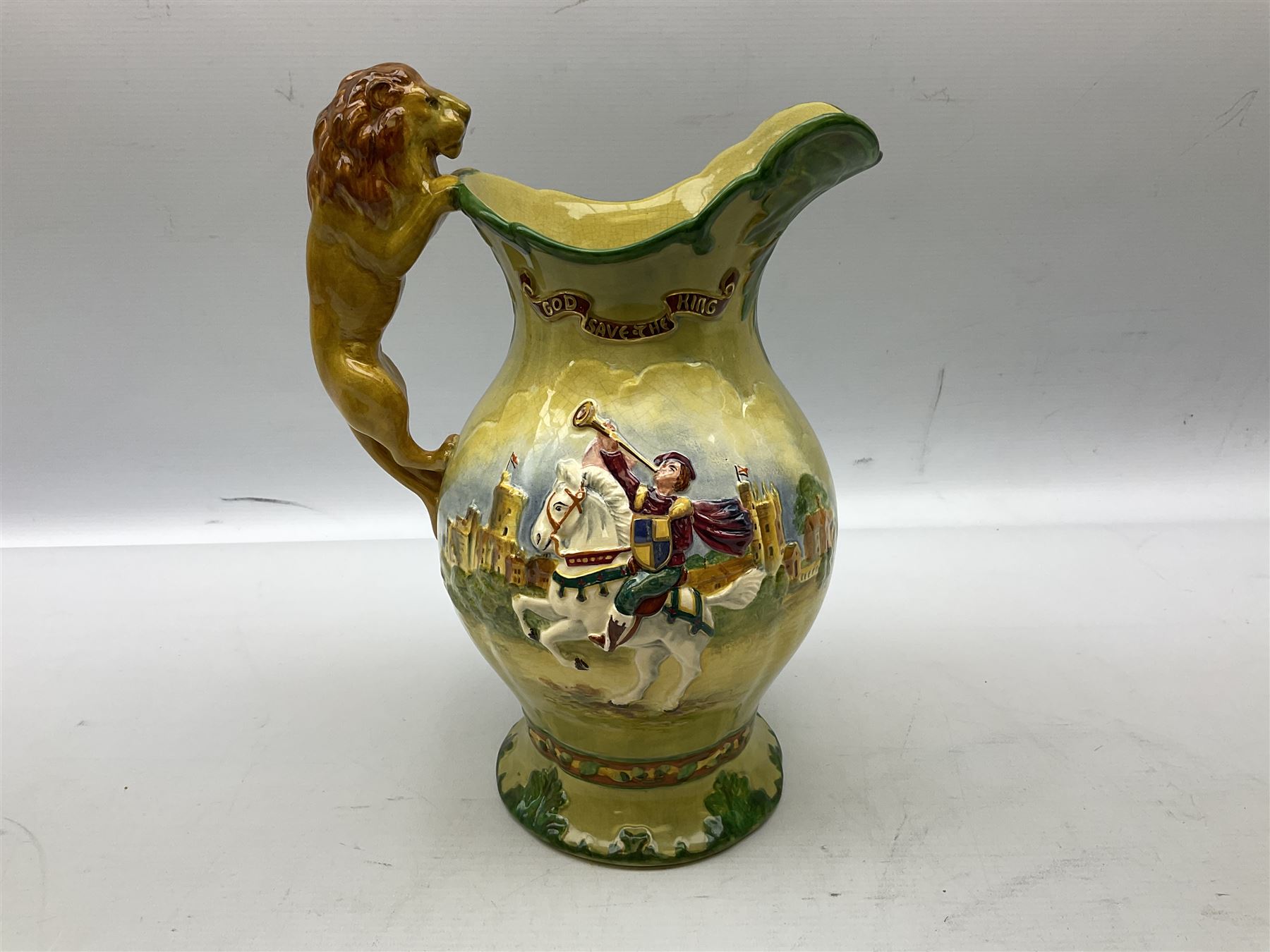 Crown Devon Fieldings George VI Coronation musical jug, with lion handle, no. 179 of an edition of 1500, H29cm
