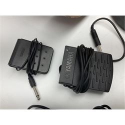 Spanish BM acoustic guitar with mahogany back and sides and spruce top L101cm; in cello carrying case; Roland foot pedal and two Yamaha foot pedals; tin D# organ pipe; folding music stand etc