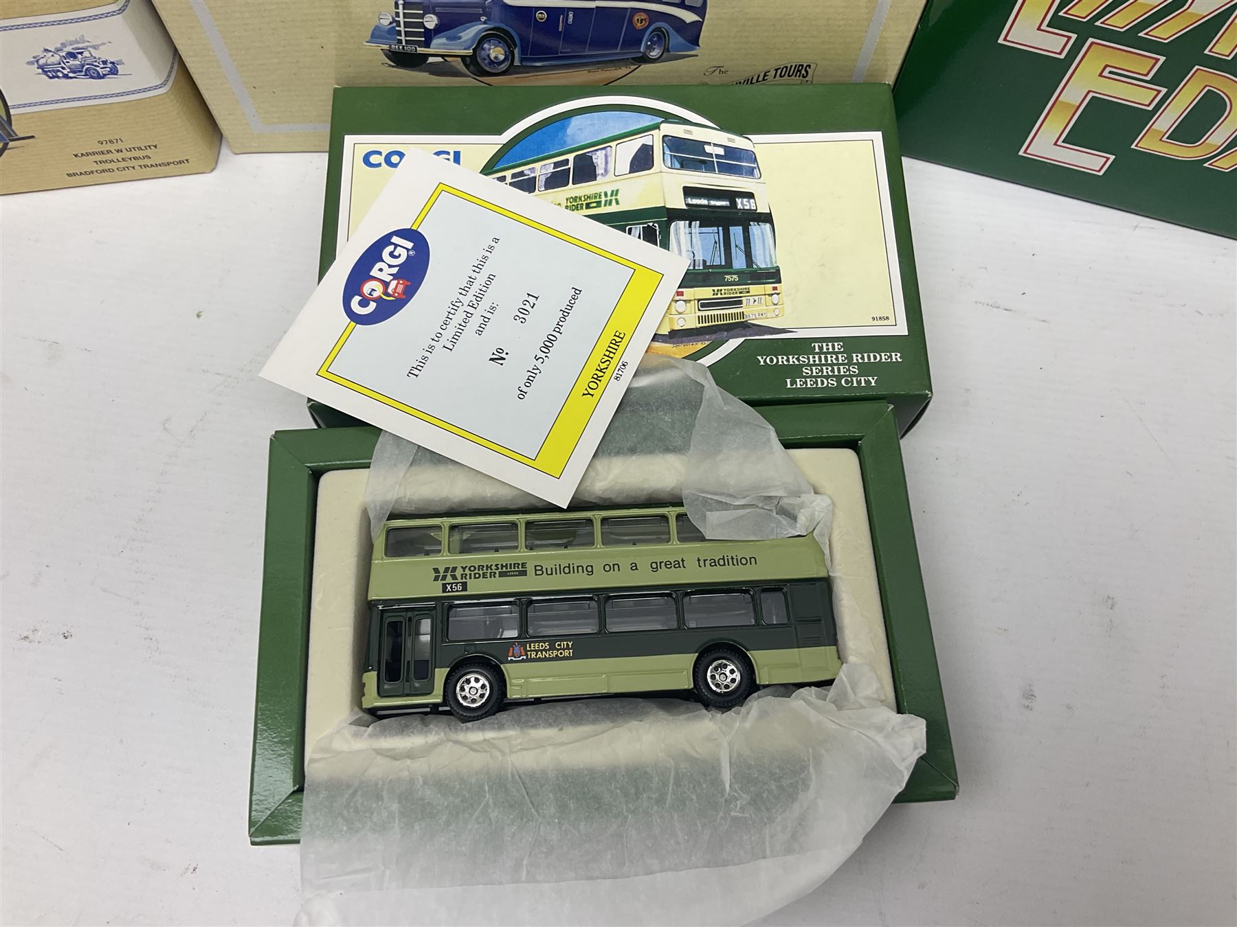 Corgi - twenty eight modern die-cast model coaches, buses and wagons to include Corgi Classics 35305, 96991, 97002, two 97108, 97208, 97267, 97335, 97871 and 98162; limited edition sets D949/26, 97107 and 97185; The Yorkshire Rider Series 91700, 91853, 91858 and 91862; all but one in original boxes or perspex display cases, most with certificates (27)