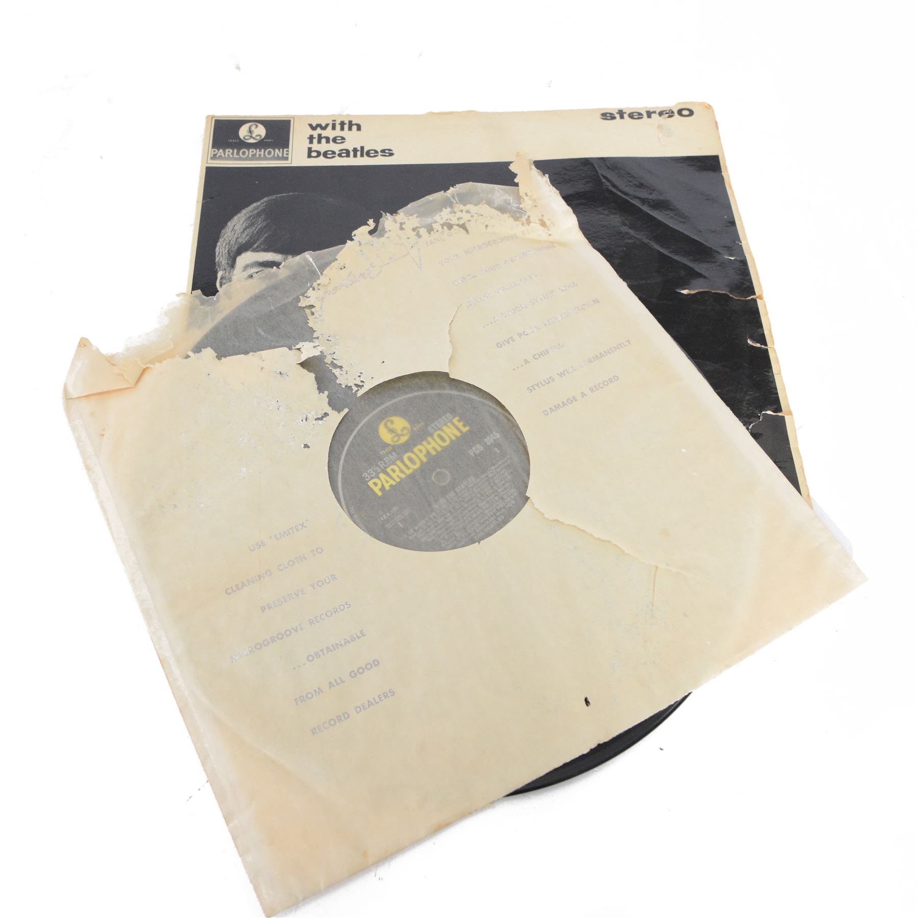 The Beatles 'With The Beatles' vinyl LP, UK Stereo Original, Parlophone PCS 3045, together with two Beatles 7