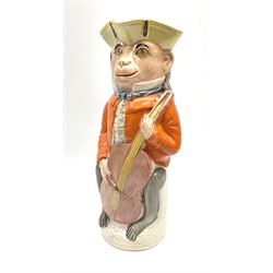 19th century Staffordshire Toby jug modelled as a monkey playing a cello H30cm. 