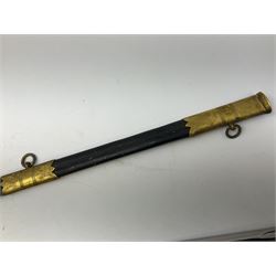 WW1 George V era 1827 Pattern Royal Naval Officer’s sword, the 80cm fullered steel blade decorated with crown, fouled anchor etc and marked Gieves Portsmouth London Edinburgh Devonport to the ricasso, gilded hilt with fouled anchor and crown, wire-bound ray skin grip, lion’s head pommel with mane backstrap, folding/locking langet and full bullion knot; in  leather scabbard having twin brass lockets with hand engraved panels and twin suspension rings L94cm overall. Provenance: By direct family descent from Brian Heathcote HMS Conqueror later Superintendant in the Liverpool Special Constabulary.