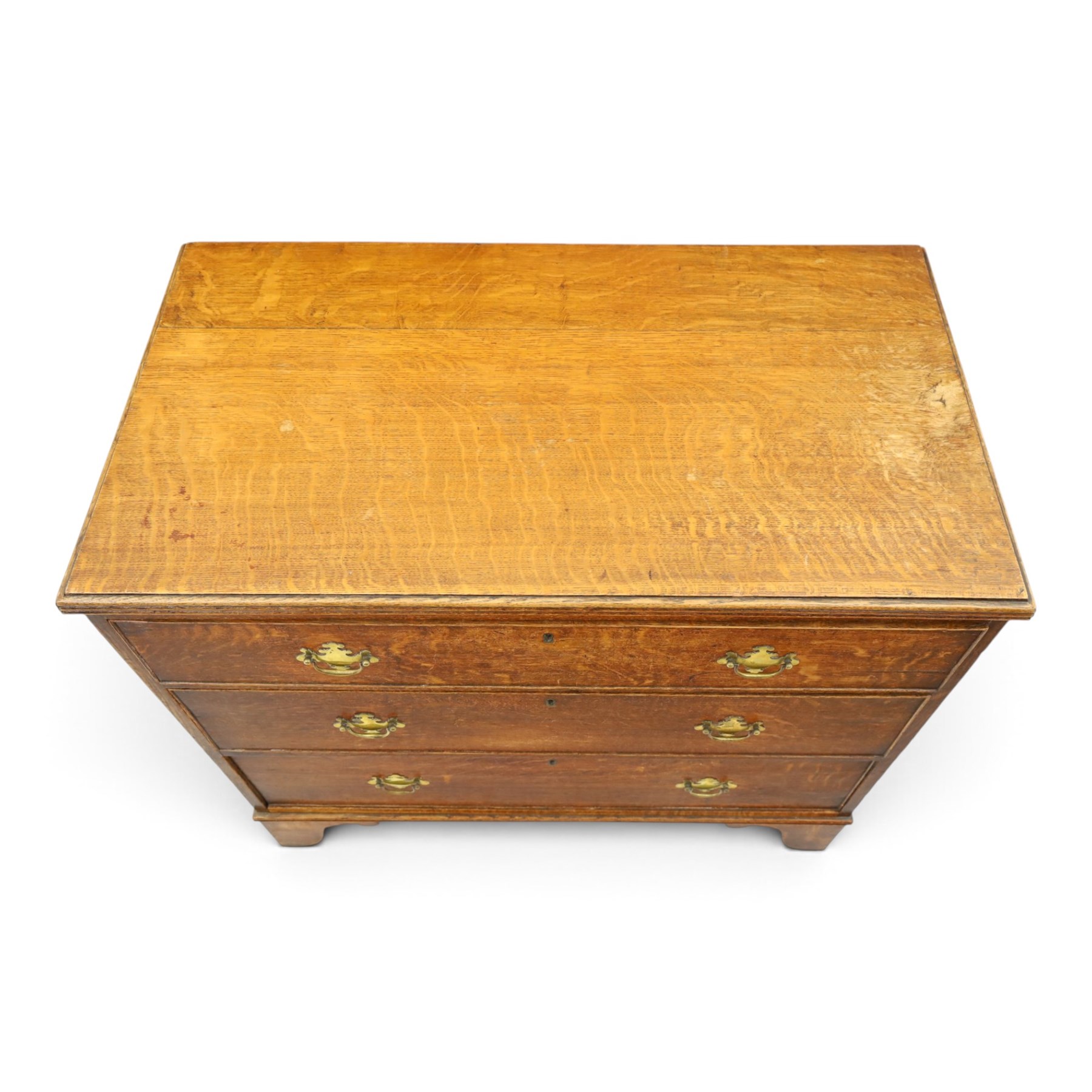 18th century oak straight-front chest, rectangular caddy-top with reeded edge, fitted with three graduating cock-beaded drawers, raised on bracket feet