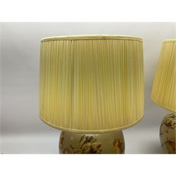 Pair of Potichomania tulip design glass table lamps, by Jenny Worrall, H40cm, with cream pleated lampshades. 