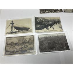 Collection of twenty six postcards depicting Airships/Zeppelins, including two pairs depicting the tragedy of the R.38. wrecked over Hull August 24th 1992, many unused.