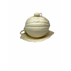 20th century Leeds creamware, comprising chestnut basket and stand, small tureen and cover, ladle, and associated stand, candlestick with stem modelled as a dolphin, teapot, tureen and cover in the form of a melon with fixed stand, and toast rack (toast rack a/f), each with impressed mark beneath. 