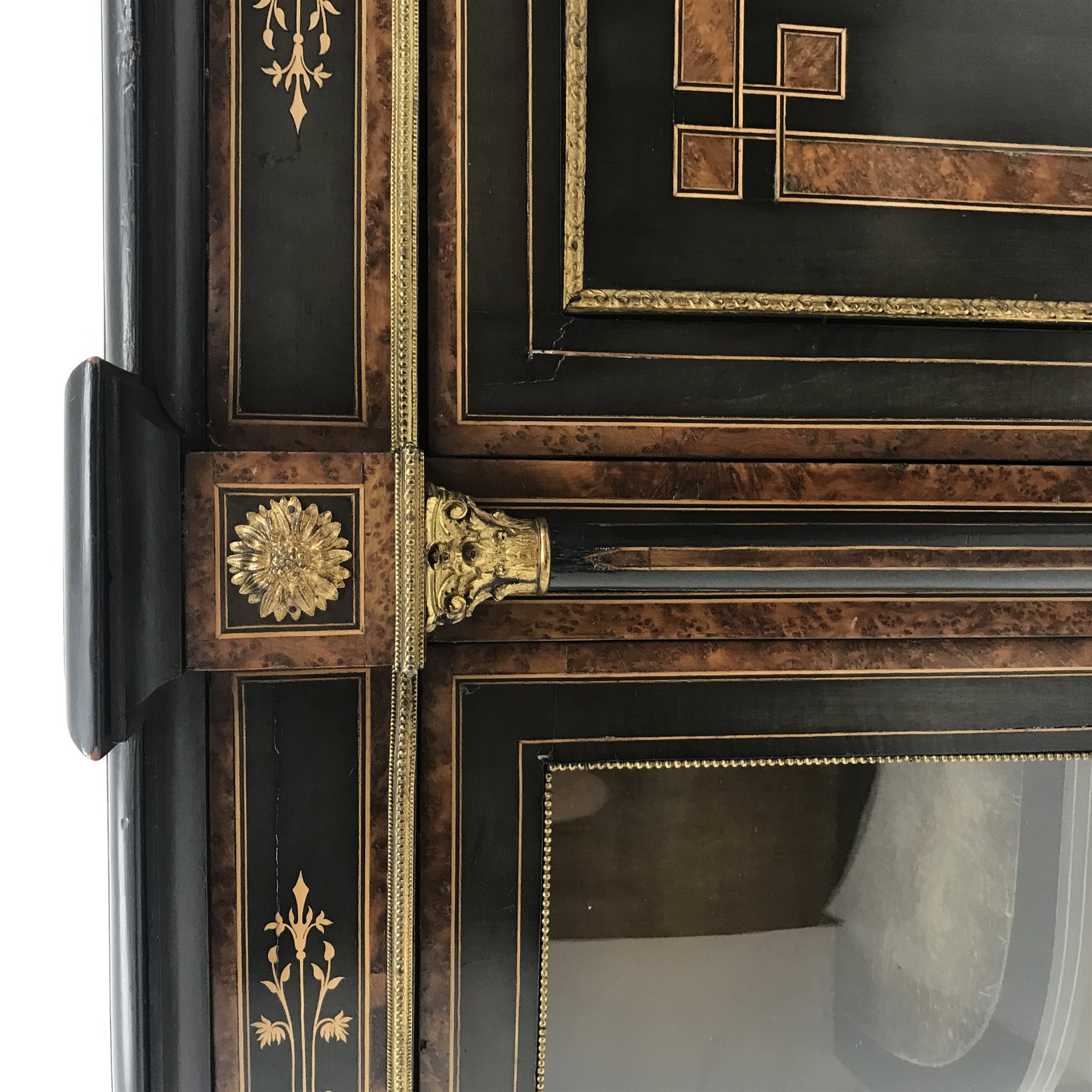 Victorian gilt metal mounted and amboyna banded ebonised credenza