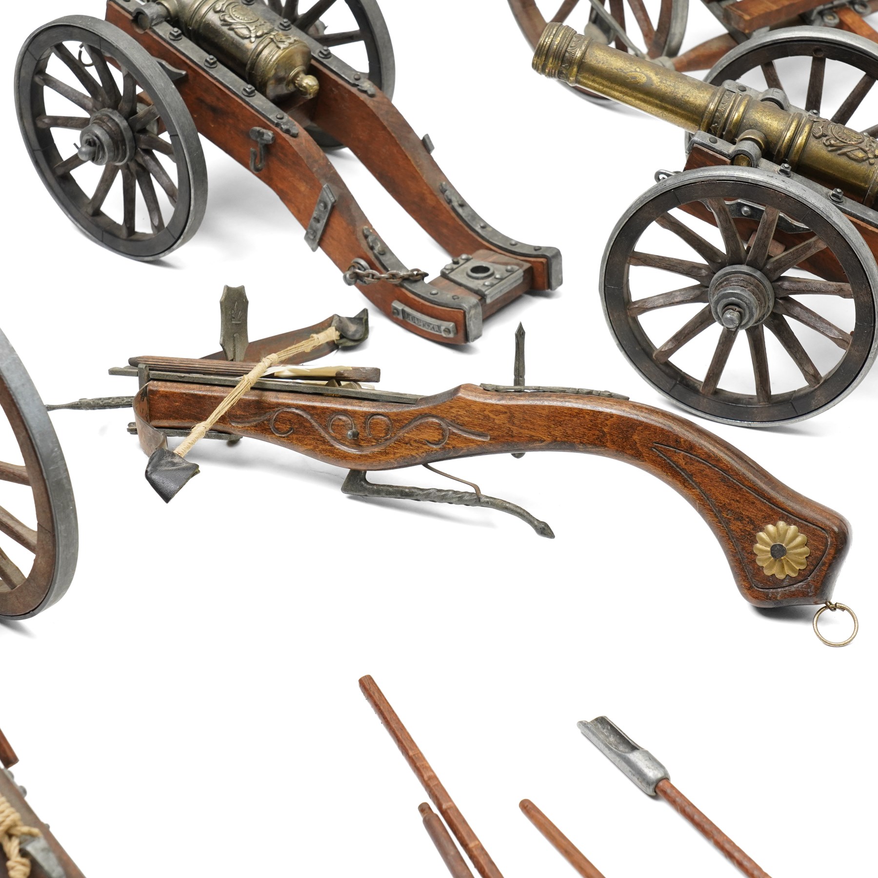 Six scale wood and metal models of cannons, length of longest 32cm together with a gun carriage and model crossbow
