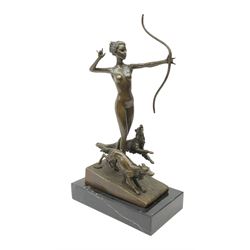 An Art Deco style bronze, after Josef Lorenzl, modelled as a nude female figure holding a bow, with two dogs, signed and with foundry mark,  raised upon a rectangular marble base, overall H33cm. 