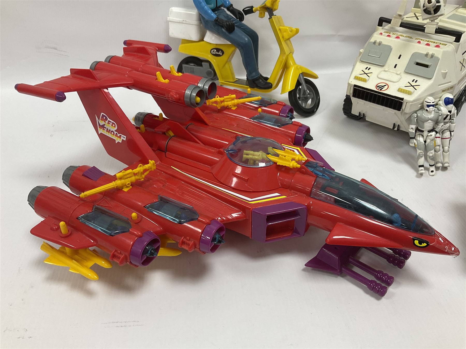 Manta Force Red Venom 1987 Bluebird Toys PLC toy plane with associated figures, with three more toy vehicles and figures comprising Lanard 1996 S.T.A.R Force Mobile Ground Support truck, Hasbro 2000 Action Man motorbike with side car, Sindy moped 
