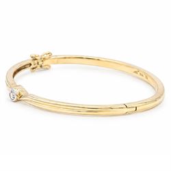 9ct gold diamond hinged bangle, set with a single round brilliant cit diamond, hallmarked