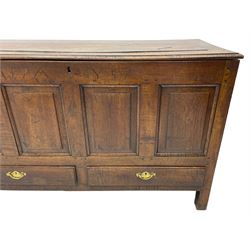 Georgian oak mule chest, moulded rectangular hinged lid over quadruple fielded panel front, the frieze inscribed '17 A Y 57', fitted with two drawers, panelled ends and back, on stile supports