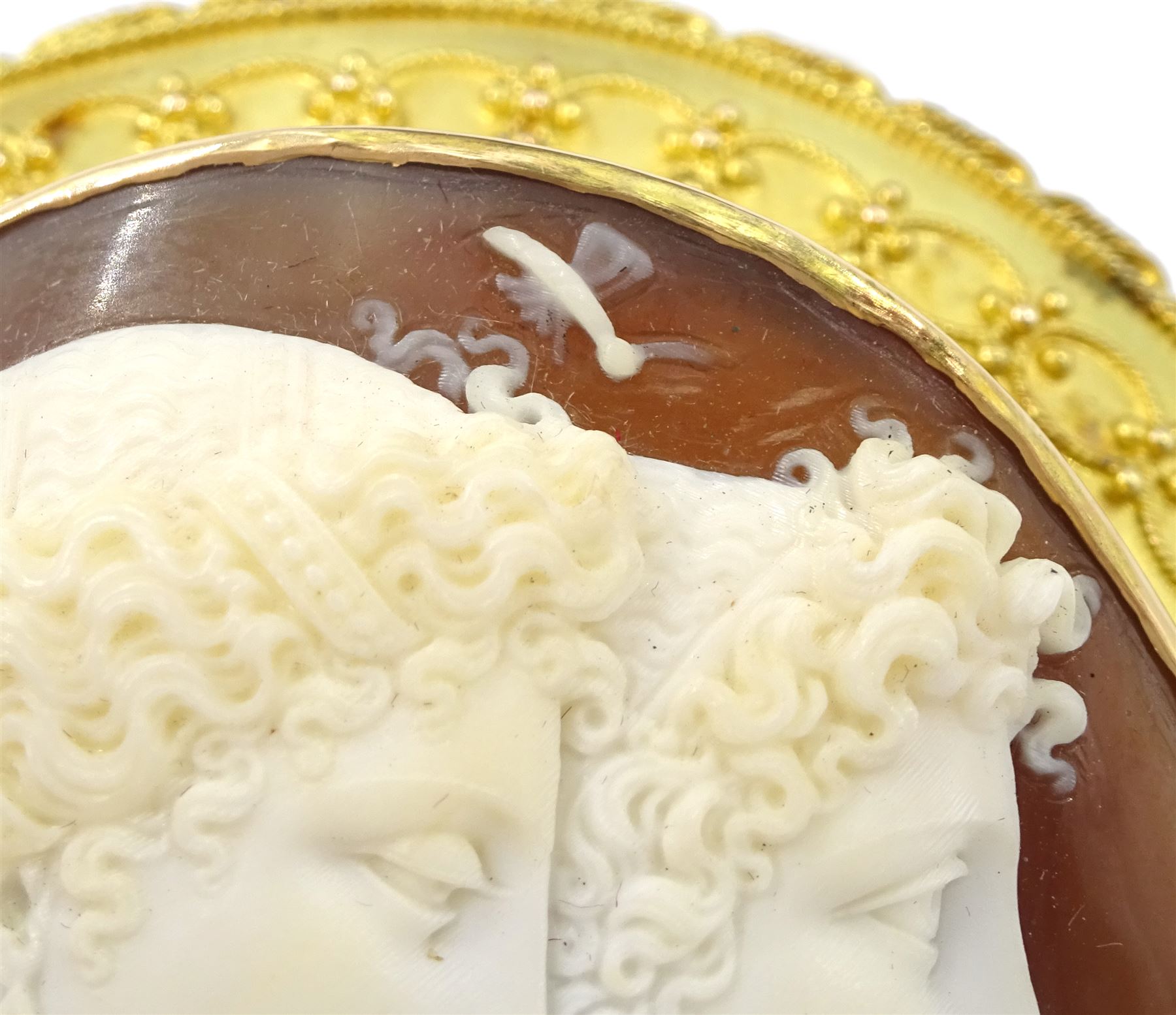 Victorian fine cameo brooch depicting Cupid and Psyche, in 18ct gold Etruscan Revival gold wirework mount, the reverse indistinctly signed Lamary, in original fitted silk and velvet lined case