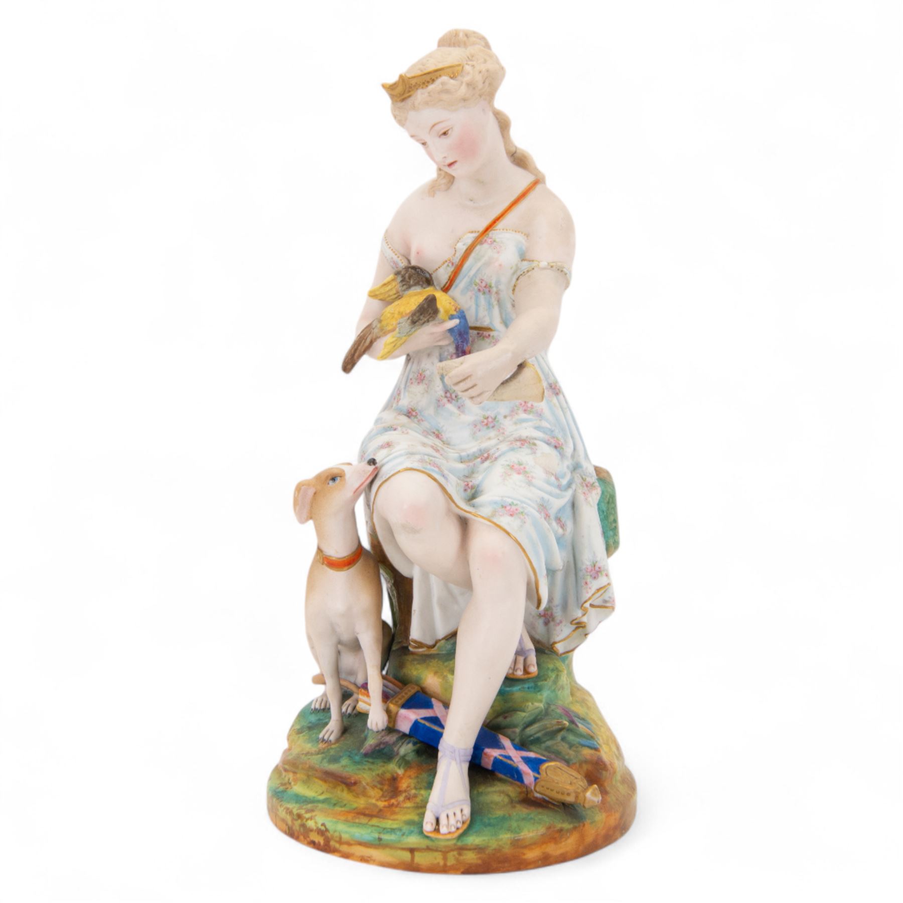  20th century bisque figurine, modelled as Artemis seated upon a rock, with impressed L&M mark beneath, H36cm