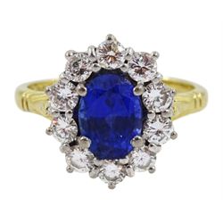 18ct gold oval Ceylon sapphire and round brilliant cut diamond cluster ring, Sheffield 1995, sapphire approx 1.40 carat, total diamond weight approx 0.55 carat