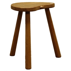  'Mouseman' three legged oak stool with dished and adzed kidney shaped top, W37cm, H45cm  