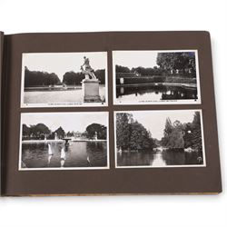 Two early to mid 20th century postcard albums, containing black and white and colour postcards of France, Turkey and Egypt, together with some personal photographs and newspaper clippings