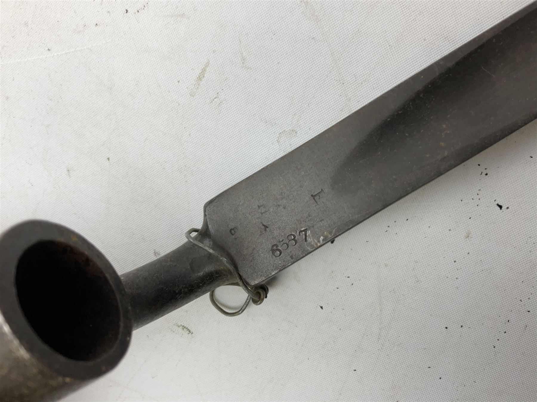 British Pattern 1876 socket bayonet with 43cm steel triangular blade L52cm overall; another socket bayonet with cruciform blade; No.4 Mk.II spike bayonet in metal scabbard with webbing frog; and 1955 Army jack knife by J.H. Thompson Sheffield (4)