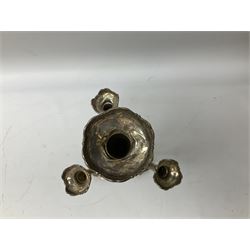 Four hallmarked silver trumpet vases, total weight 108g, upon silver plated stand with foliate decoration and bun feet