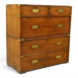 19th century brass bound mahogany campaign chest, with brass bound corners and edges, recessed brass handles, the upper section with two short over one long drawer, the lower section with two long drawers