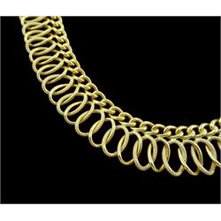 18ct gold fancy link necklace, polished and textured curb and woven openwork links, stamped 750