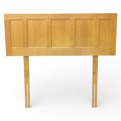 Yorkshire oak single headboard, the panelled back with visible dowls, raised upon plain supports 