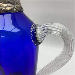 20th century silver plate mounted blue glass claret jug, modelled in the form of a parrot, the blue glass body with silver plated parrots head with inset glass eyes, upon two silver plated talon feet, H29cm