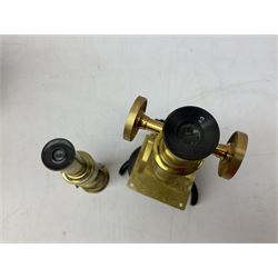  Brass field microscope, together with a cased microscope and twenty five microscope slides