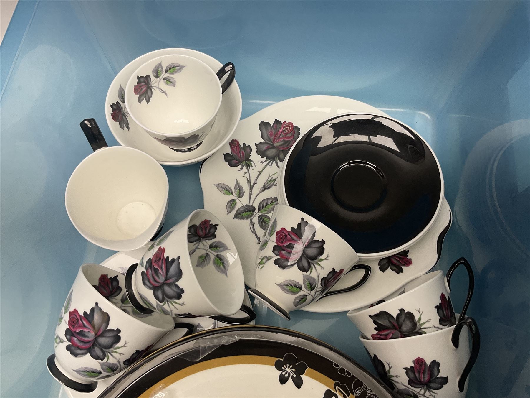 Royal Albert Masquerade pattern tea service for six, together with Royal Albert Dogwood pattern teacup and saucer and Alfred Meakin tea and dinner wares decorated with gilt on cream ground to include lidded tureens and oval serving plates etc in two boxes