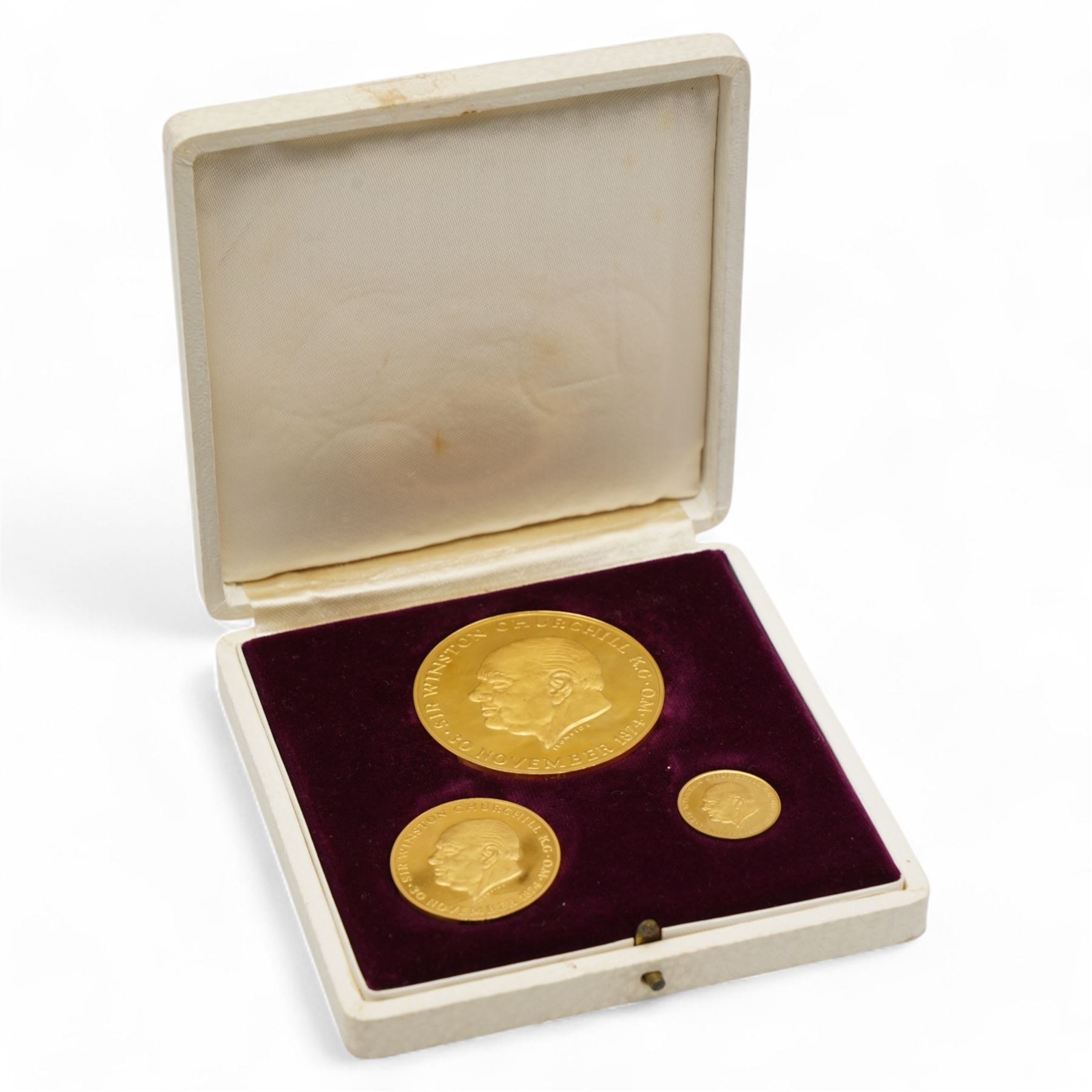 Sir Winston Churchill 'This Was Their Finest Hour' set of three eighteen carat gold medallions, total weight approximately 71 grams, housed in a fitted case