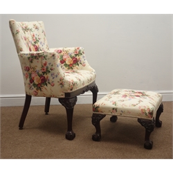  Early 20th century Chippendale style armchair, upholstered in floral pattern fabric, shell carved cabriole supports with ball and claw feet (W66cm) and a matching stool (2)  